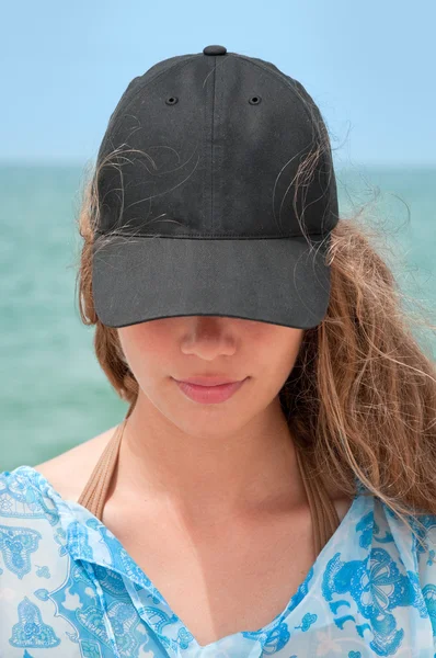 Girl with black baseball cap — Stock Photo, Image
