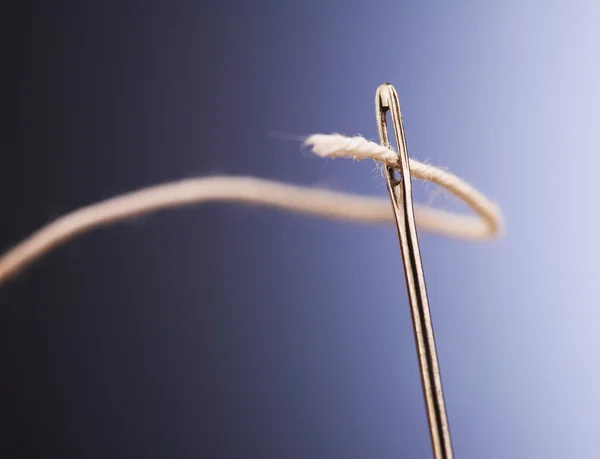 Needle with a thread — Stock Photo, Image
