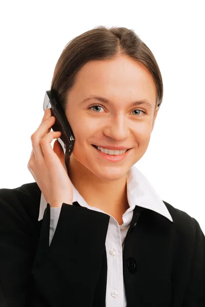 Улыбающаяся деловая женщина разговаривает по мобильному — стоковое фото