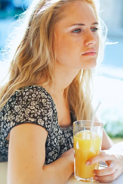 Woman with juice — Stock Photo, Image