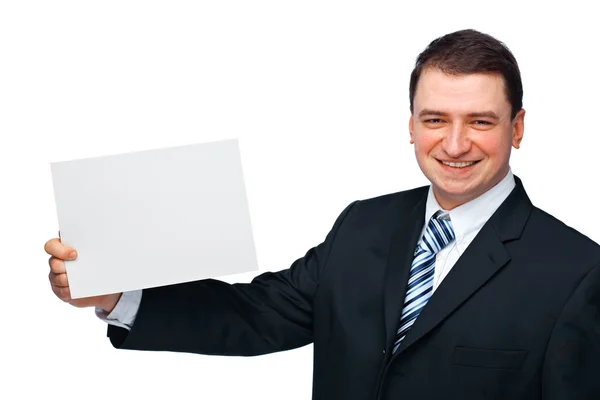 Бизнесмен держит пустую доску объявлений — стоковое фото