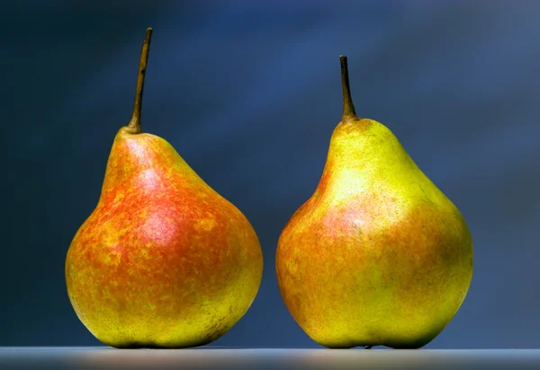 Two pears on a dark background — Stock Photo, Image