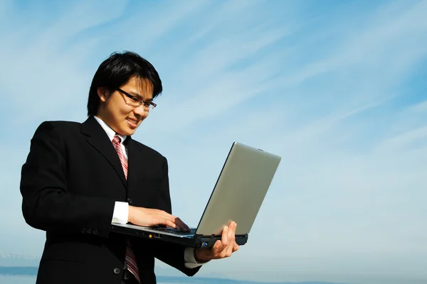 Businessman and laptop — Stock Photo, Image