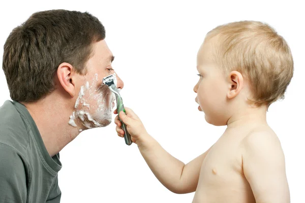 Boy shaving father — Stock Photo, Image