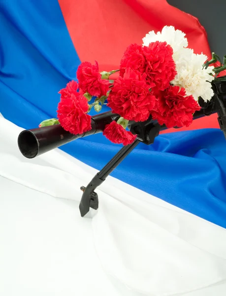 stock image Machinegun And Flowers