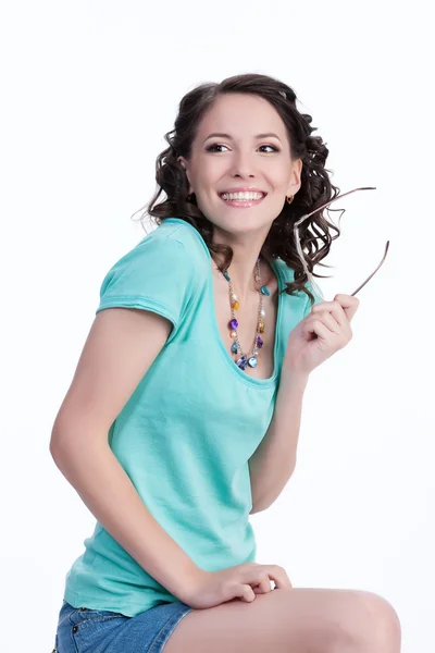 Emocionální mladá žena s papírový sáček — Stock fotografie