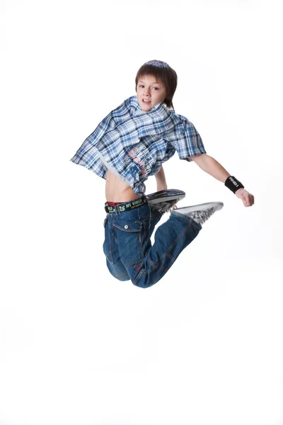 Adolescente menino pulando — Fotografia de Stock