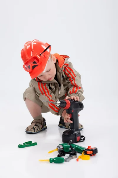 Niño y herramientas —  Fotos de Stock