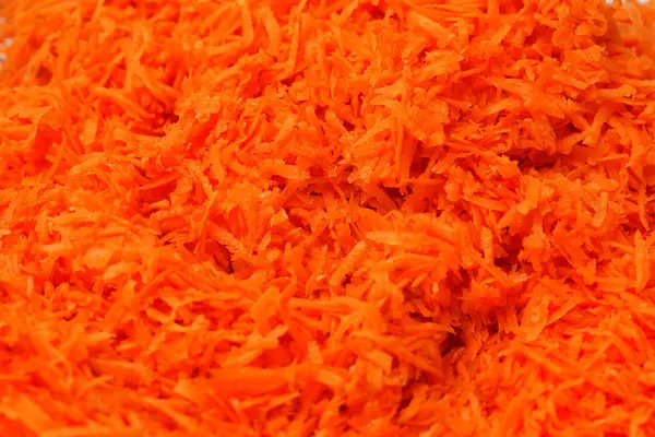 stock image Freshly grated carrots