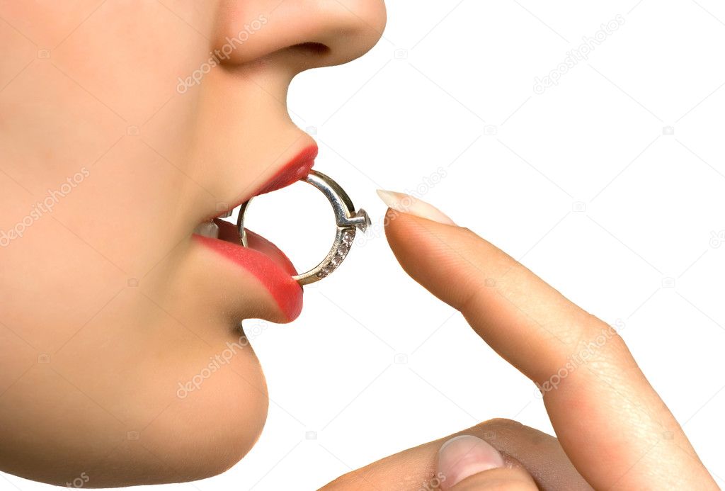 Woman lips, engagement ring and finger