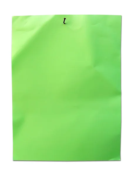 Grünes Papier mit Nagel — Stockfoto