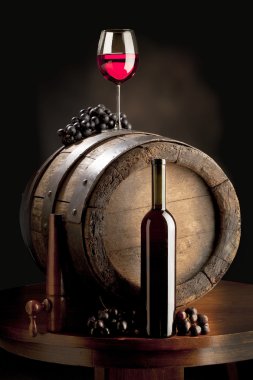Still life with red wine and old barrel clipart