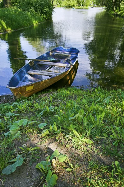 stock image Boat at lake shore