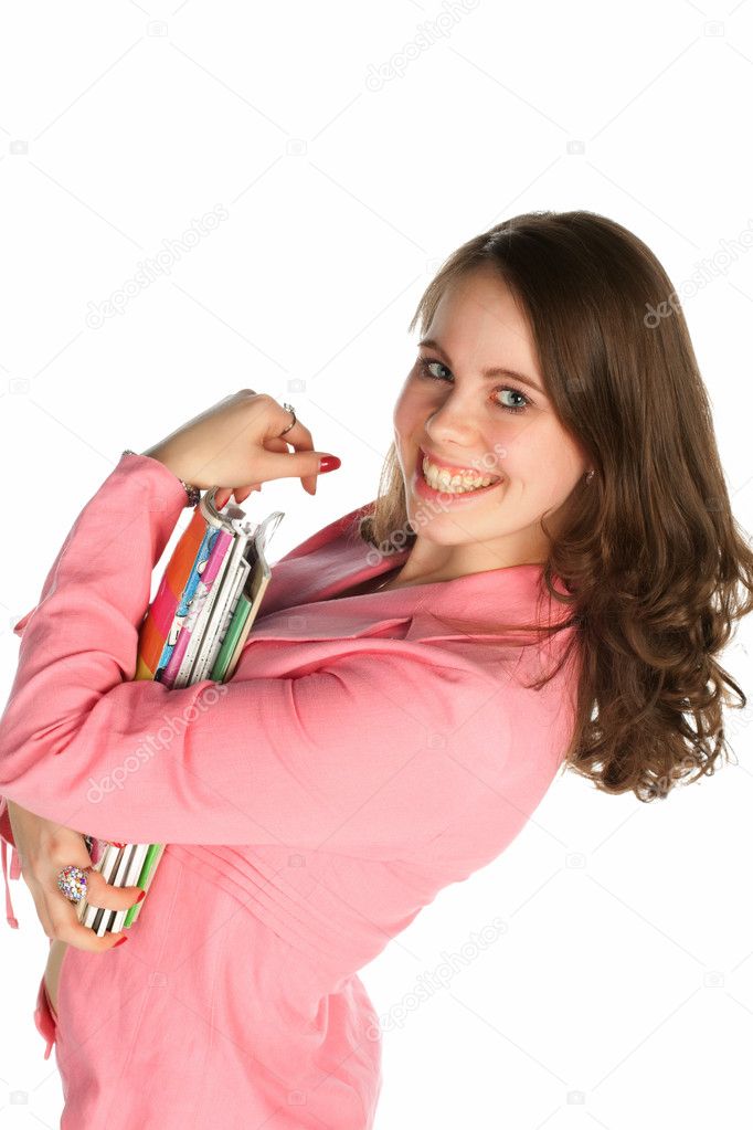 Beautiful young woman with a magazine