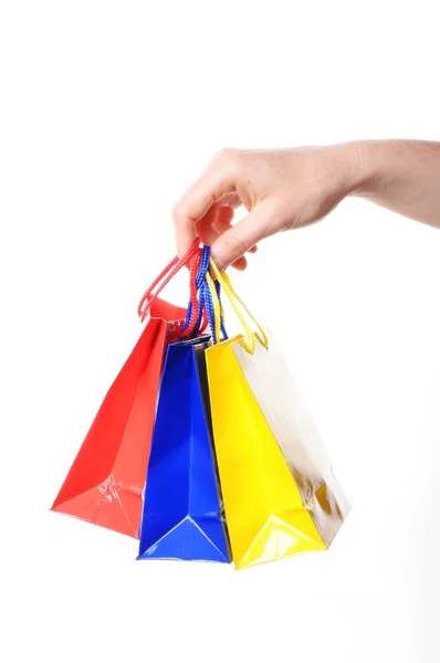 Carregando um monte de sacos de compras — Fotografia de Stock