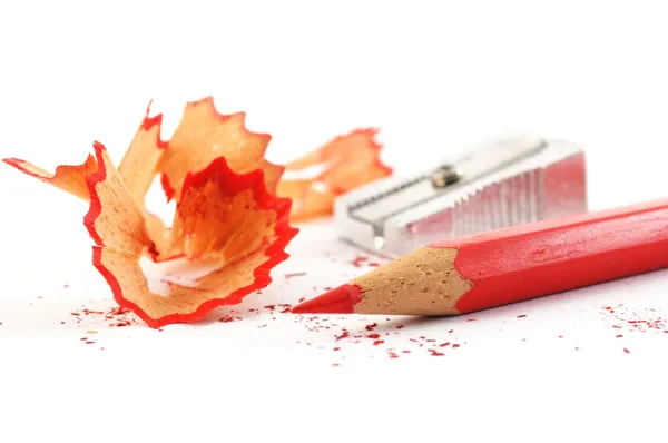 Red crayon wiht shavings — Stock Photo, Image