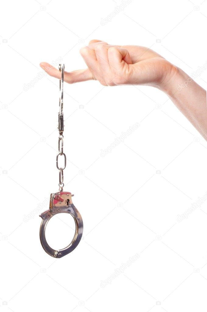 Hand wearing handcuffs