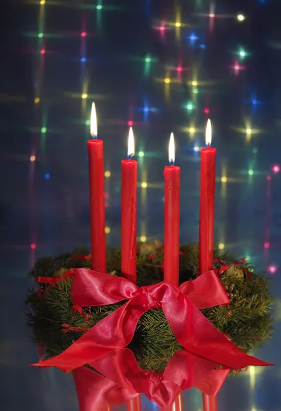 Red candles on christmas wreath — Stock Photo, Image