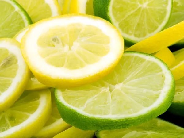 Citron- och limeskivor Stockfoto