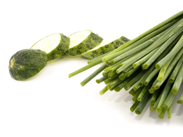 Fresh chives and sliced cucumber — Stock Photo, Image