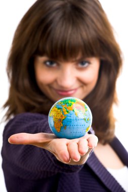 Beautiful woman holds the globe in hand. clipart