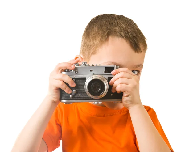 Liten pojke med fotokamera Royaltyfria Stockbilder
