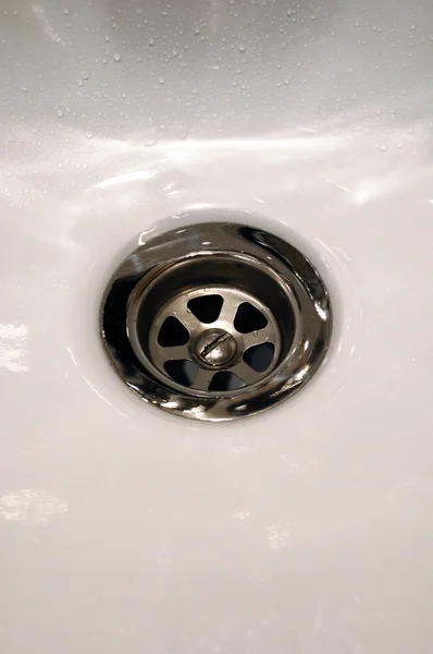 Kitchen sink with drops of water — Stock Photo, Image