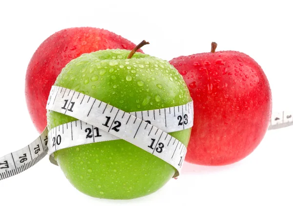 Яблоки измеряют метр — стоковое фото