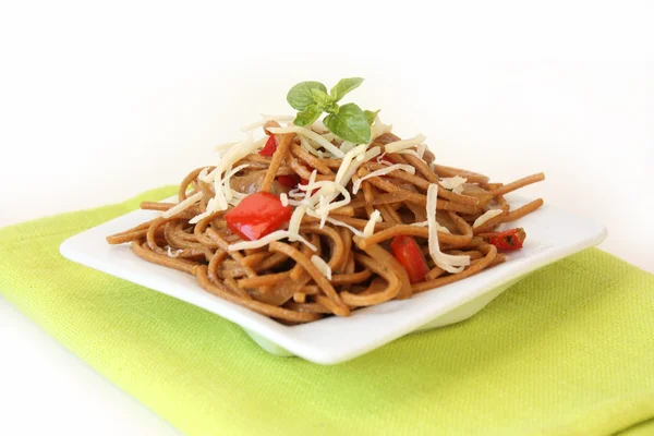 stock image Fried noodles with vegetables and basil