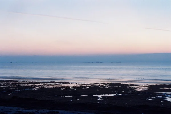 Захід сонця над морем Стокова Картинка
