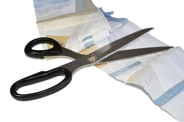 Scissors and patchwork Stock Image