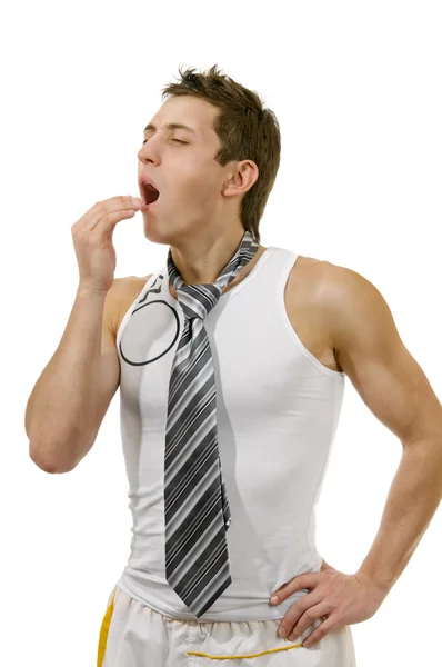 Yawning young man isolated on white — Stock Photo, Image