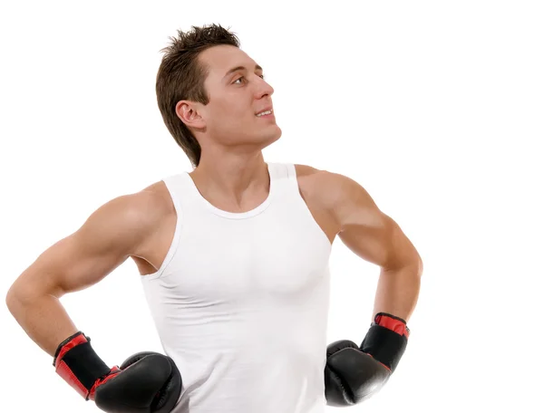 Stolzer Boxer mit Boxhandschuhen nach dem Kampf lizenzfreie Stockbilder