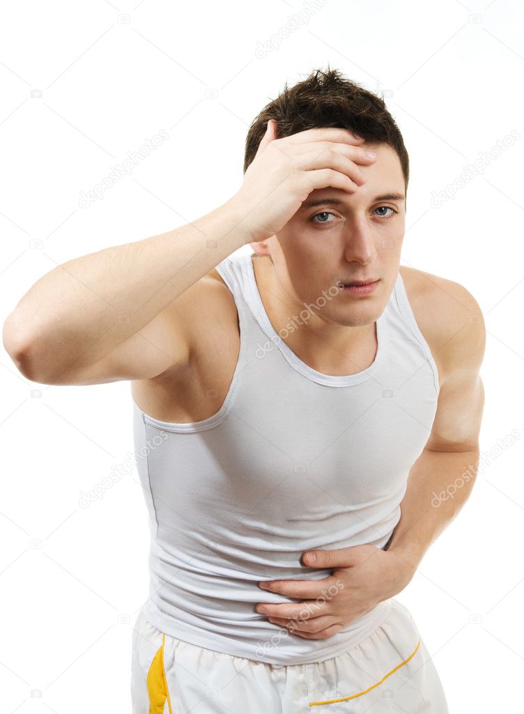 Young man having stomach pain. Isolated over white background