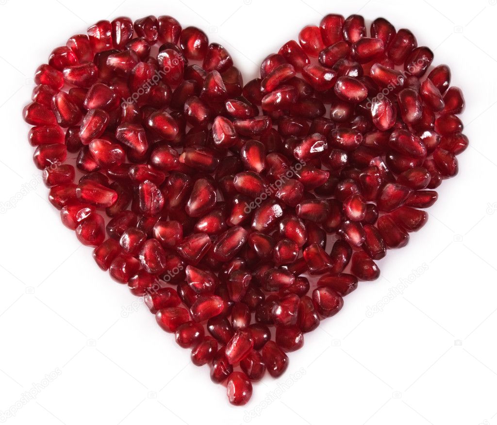 Heart shaped pomegranate seeds, high key