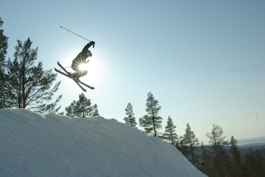 Fly on ski with the sun clipart