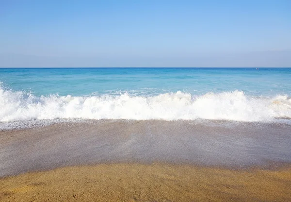 stock image Sea, waves and sandy beach.