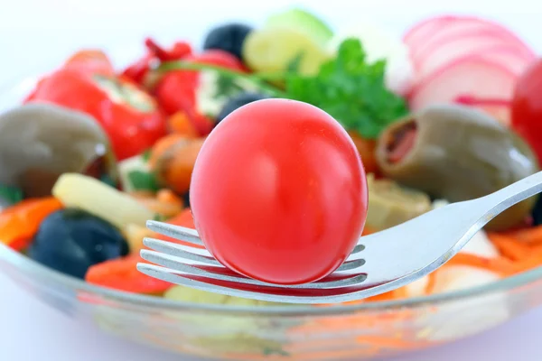 Garfo com tomate . — Fotografia de Stock