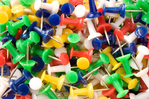 stock image Multicolored push pins.