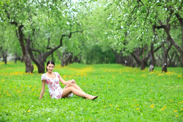 stock image Beautiful woman relaxing in forest.