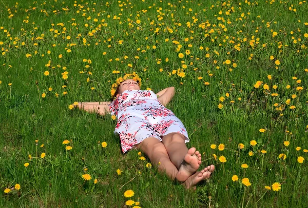 stock image Beautiful girl lying down of grass