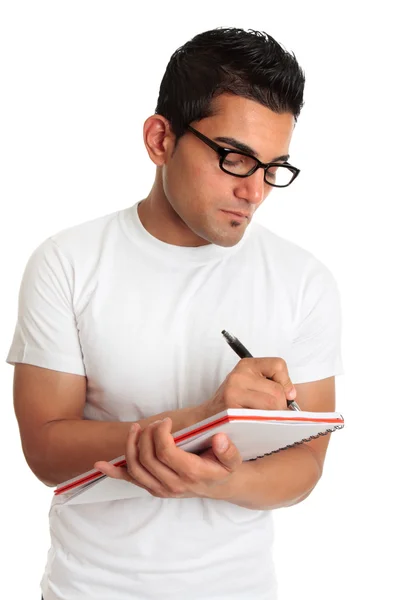 Estudante ou homem usando óculos de escrita — Fotografia de Stock