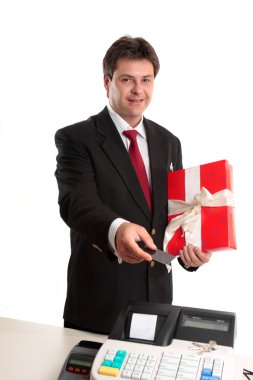 Man paying for persent with card clipart