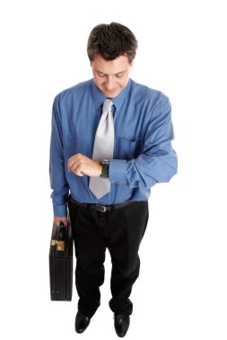 Businessman checking time clipart