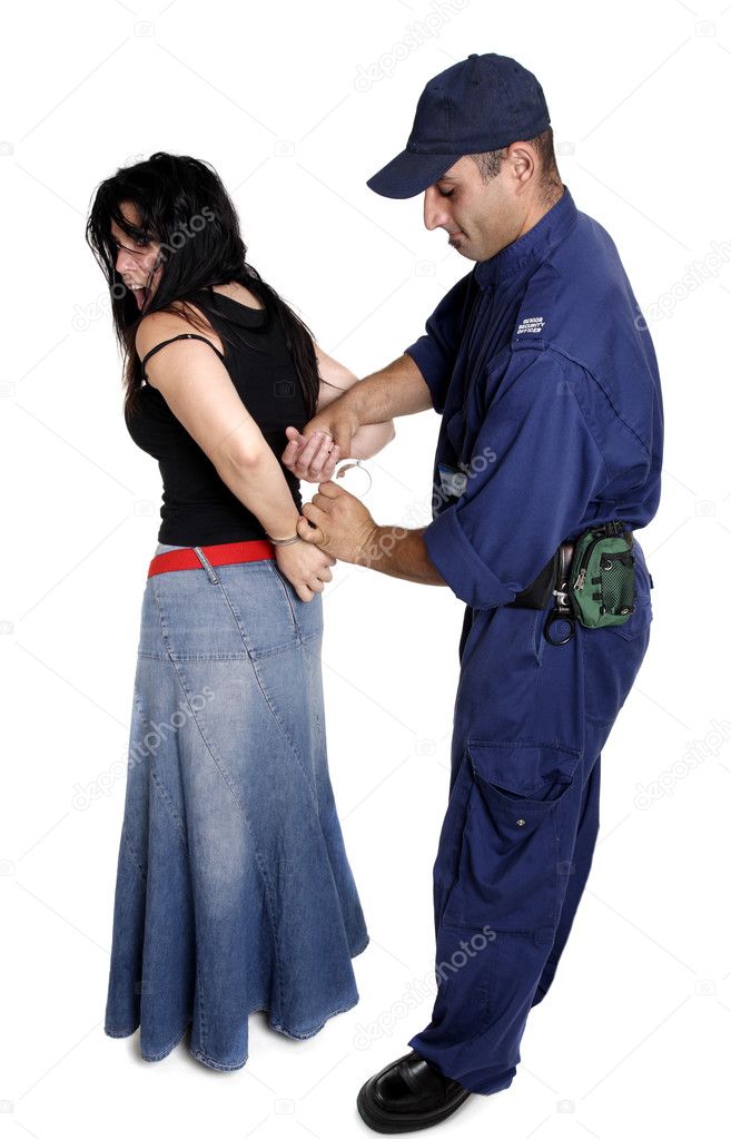An officer apprehending a female
