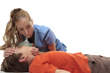 Nurse using resuscitation mask clipart