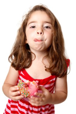 Girl eating doughnut licking lips clipart