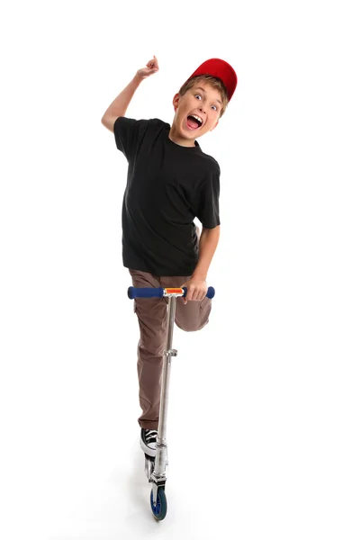Boy crazy gelukkig plezier op een scooter — Stockfoto
