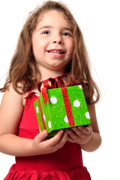 Excited girl holding a present — Stock Photo, Image