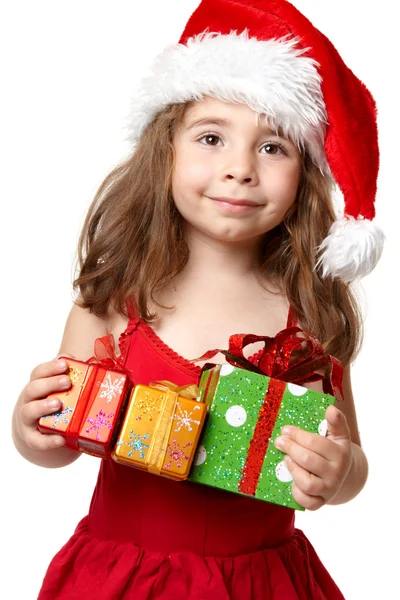 Menina segurando presentes de Natal — Fotografia de Stock